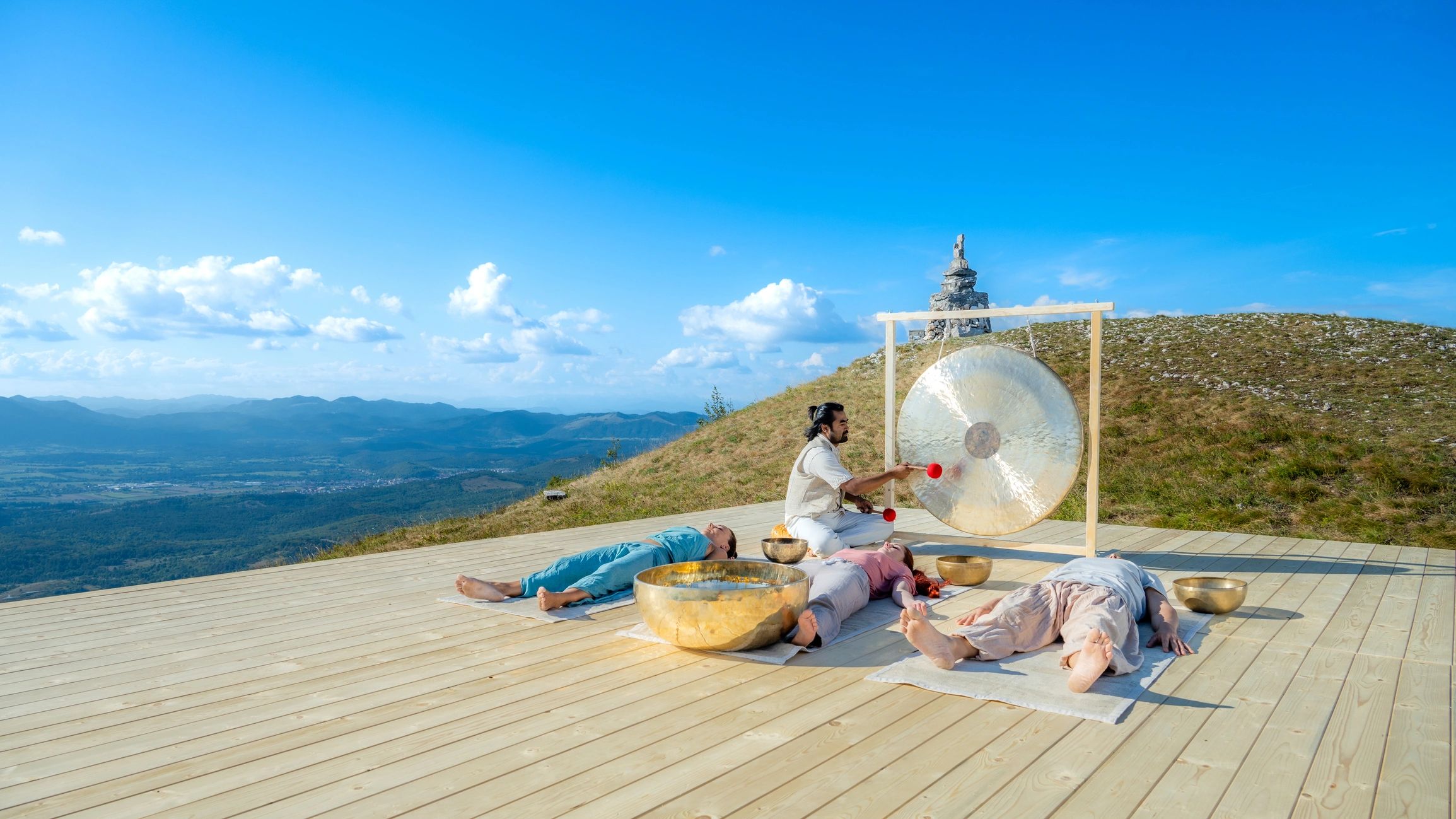 Sound healing session with gong during a group retreat